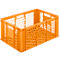 An orange plastic crate used for transporting goods. It has a honeycomb pattern.