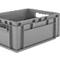 Boîte en plastique grise avec ouvertures pour poignées et coins renforcés. Inscription visible.