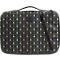 Trousse de maquillage noire avec un motif art déco doré, fermeture éclair et poignée.