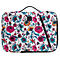 Motif floral sur un sac. Fleurs roses, bleues, jaunes sur fond blanc. Fermeture éclair noire, poignée.