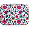 Sac de voyage avec motif floral. Fleurs roses, jaunes et bleues sur fond blanc.
