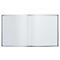 Carnet gris ouvert avec pages blanches vierges.