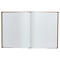 Carnet de notes ouvert avec des pages blanches et vierges. La couverture est marron.