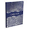 Livre bleu avec un motif de vagues argentées et le texte "Livre d'Or".