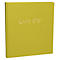 Livre jaune-vert avec lettrage doré : Livre d'Or. La couverture a une structure en tissu. Le livre est légèrement incliné.