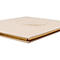 Livre carré beige, tranche dorée, gaufrage doré sur la couverture.