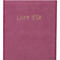 Un livre rose avec l'inscription dorée "Livre d'Or".