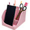 Porte-stylo rose avec téléphone, ciseaux et stylos. Le porte-stylo est divisé en plusieurs compartiments.