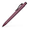 A pink ballpoint pen from Faber-Castell with clip and grip recesses, diagonal perspective.