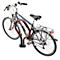 Fahrrad steht in einem Fahrradständer aus Stahl, in Lila-Tönen und Braun.