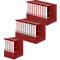 Three stacks of red binders with white spine labels.