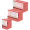 Several red file folders, stacked in different sizes. White label fields on the spines.