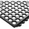 Black rubber mat with honeycomb-shaped holes. The background is white.