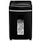 Black paper shredder with visible shredded material. Silver stripe in the middle. Control panel on top.
