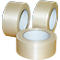 Three rolls of transparent tape on a white background. The adhesive is ribbed.