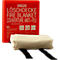 A fire blanket with a red case. The case reads "LÖSCHDECKE FIRE BLANKET COUVERTURE ANTI-FEU". The blanket itself is rolled up.