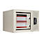 An open beige safe with two compartments filled with paper documents. The safe says "FORMAT".