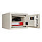 Opened beige safe door. Inside, a camera, a file folder, and an external drive are visible.