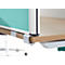 Close-up of an office desk with a green partition and silver supports. The wooden table is held by a silver bracket.