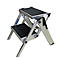 Folding step stool made of aluminum. The treads are black, the rest is silver.