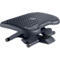 Black plastic footrest with textured surface, on X-shaped frame. Adjustable in height.
