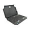 Schwarze Tastatur mit Touchpad und Klappdeckel, auf weiÃŸem Hintergrund. Blauen Akzenten.