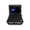 Robustes schwarzes Dell Rugged Notebook mit Tragegriff vor weißem Hintergrund.