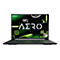 Ein geöffnetes schwarzes Laptop mit leuchtendem Display und grünem Hintergrund. Das Display zeigt Schriftzug AERO.