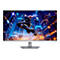 Gigabyte Gaming-Monitor mit dünnem Rahmen vor einer futuristischen Stadtkulisse.