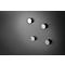 Four cylindrical magnets, two silver surfaces, dark background.