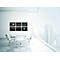 Bright conference room: table with chairs, blackboards with notes, large window view of city.