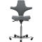 Gray office chair with curved backrest and seat. On castors, height adjustable.