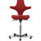 Red ergonomic office chair with curved backrest, armrests and five castors. Metal frame.