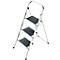 Silver step ladder with three black steps against a white background.