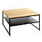 Table basse carrée, plateau en bois, cadre noir, étagère inférieure avec magazine, deux bols.