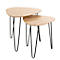 Deux tables d'appoint : aspect bois, pieds en métal noir. Plateaux de table en forme de goutte d'eau, un peu plus petit.