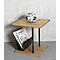 Table en bois avec cadre noir, un magazine et une boule avec motif floral.