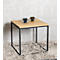 Table carrée en bois avec dessus brun clair et cadre en métal noir.