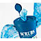 Blue cleaning wipes in a bucket. Bucket open with protruding cloth. Inscription: SCRUBS.