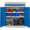 Open blue workshop cabinet with shelves filled with tools, boxes and tape. Blue doors.