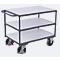 Three-tiered transport cart, gray frame, white shelves, handle, wheels with brakes.