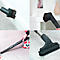 Different vacuum cleaner attachments in use: brush at a corner, at a trim, crevice tool on sofa, floor brush on carpet.
