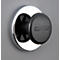 Black magnet with "THE MAGNET SOURCE" on a silver ring on a grey wall.
