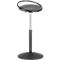 Black standing stool with round seat and hoop. The base and central column are black, the column itself is silver.