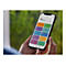 Person hält Smartphone mit HP Smart App. App-Icons: Zubehör besorgen, Druckbares, Shortcuts, Mobile Fax, Fotos drucken, Dokumente drucken, Kamera scannen, Hilfe & Support, Drucker scannen, Kopieren.