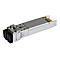 Module SFP argenté avec connecteur noir, vue détaillée. Le connecteur est à gauche.