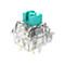 Un interrupteur de clavier transparent avec une tige bleu sarcelle et un boÃ®tier transparent. La tige a un signe plus.