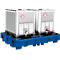 Two white IBC containers with hazardous substance labels on a blue spill containment. A red tap on the right.