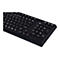 Schwarze Computertastatur mit weiÃŸen Tasten, die aus der Perspektive fotografiert wurde. Die alphanumerische Tastatur und ein Nummernblock sind zu sehen.