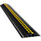 Black cable duct with yellow markings.